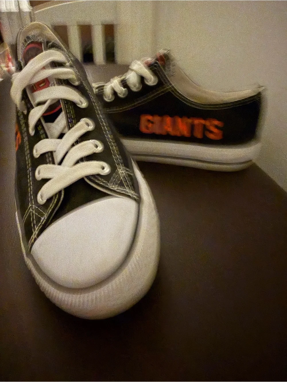 Black Low-Top Athletic Sneakers with Orange 'GIANTS' Accent